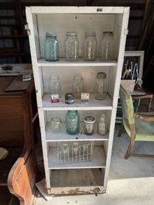 lot 86 image: Caninet with vintage canning Jars