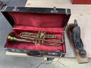 lot 95 image: Trumpet and wood Plane
