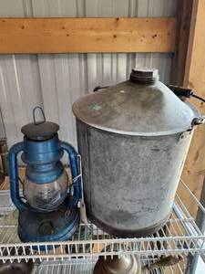 lot 129 image: Blue Lantern and Vintage Can