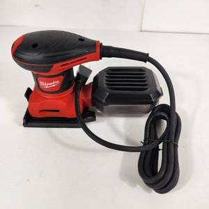 lot 28 image: New Milwaukee 6033-21 14 Sheet Corded Palm Sander 120V