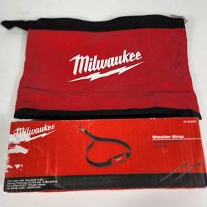 lot 60 image: New Milwaukee Shoulder Strap 49-16-2722 And Small Tool Bag Red Some Dirt On Bag