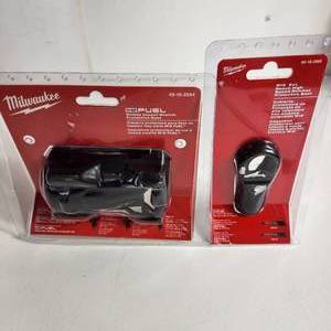 lot 71 image: Lot Of Two Milwaukee Items M12 Stubby Impact Wrench Protective Boot And Reach High Speed Ratchet Protective Boot