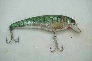 lot 206 image: Vintage Big O by Cotton Cordell Fishing Lure 6.5