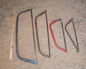 lot 19 image: Set of Four Bow Saws