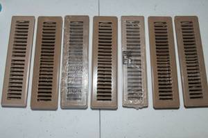 lot 45 image: Set of Seven Tan Heat Registers  Floor Vent Covers  11.75 x 2