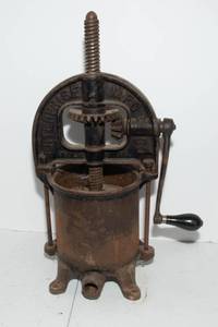 lot 68 image: Antique Enterprise Mfg. Co. Cast Iron Sausage Stuffer  Fruit Press  Model 2070, 15T