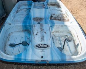lot 74 image: Pelican 4-Person Paddle Boat  Untested, Needs Cleaning