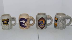 lot 99 image: Minnesota Vikings Beer Steins - Set of Four