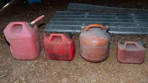 lot 105 image: Four Gasoline Storage Cans