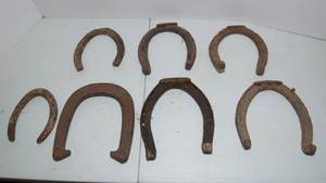 lot 123 image: Seven VintageAntique Horse Shoes - Various Sizes