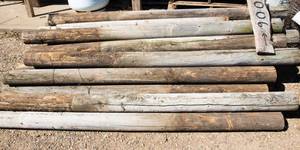 lot 171 image: A Large Stack of Wood BeamsPosts