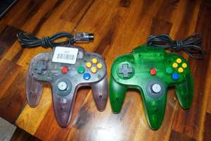 lot 237 image: 2 Nintendo 64 Gaming Controllers