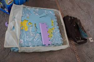 lot 325 image: Foam Floor Puzzle Pieces & Diaper Bag