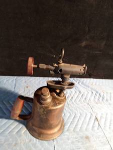 lot 28 image: Vintage brass torch with wooden handle