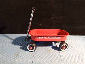 lot 37 image: Radio Flyer metal doll wagon
