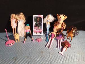 lot 38 image: Barbies, Snap Star Dawn, Tigger, Mermaid and more