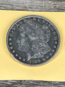lot 270 image: 1889-O Morgan Silver Dollar