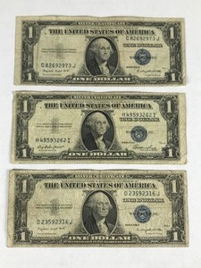 lot 307 image: 3 - Blue Seal 1 Dollar Silver Certificates