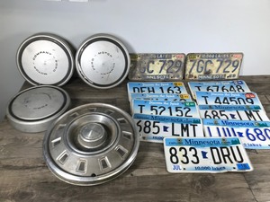 lot 318 image: Lot of License Plates and Hub Caps