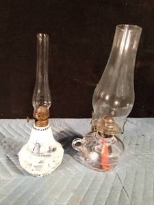 lot 76 image: 2 Glass oil lamps with chimneys