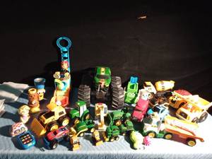 lot 53 image: Monster truck, John Deere tractors & semi, Cat dump truck, Cat Jeep, Cat tractor, Spider Man monster truck and more