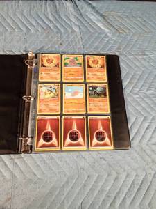 lot 49 image: 90 Pokemon cards in binder