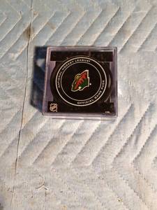 lot 27 image: Official NHL Wild hockey game puck in original case and never has been opened