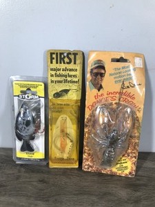 lot 392 image: 3 Fishing Lures in Original Packages - Storm Kickin Slab - Torque Lure - Bill Dance Dances Craw