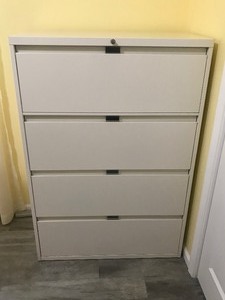 lot 7 image: 4 Drawer Lateral Metal File Cabinet with Key - smoke free house