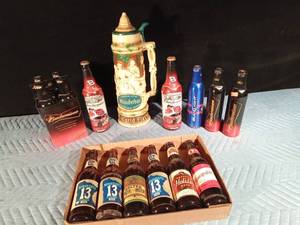 lot 178 image: Wunderbar Pilsner Beer advertisement stein like and collectable beer bottles including Dale Earnhardt, MN 13, Walter, Holiday, Hauenstein and metal Budweiser metal beer bottles