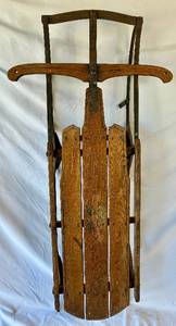 lot 55 image: Vintage Flexible Flyer Wood and Metal Rail Sled