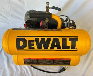lot 14 image: DeWalt 4 Gallon Stacked Tank Compressor Model D55153