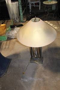 lot 80 image: Artisan Metal Lamp with Unique Geometric Design