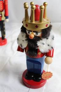 lot 140 image: King Nutcracker Figurine with Red and Gold Crown