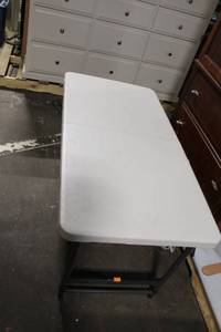 lot 150 image: Lifetime Folding Utility Table 48 x 24