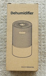 lot 176 image: New in the Box Petite Dehumidifier