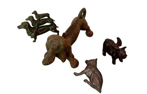 lot 149 image: Cast Iron Winged Flying Pig Figurine Paperweight Statue, Cast Iron Dachshund Boot Scraper and More