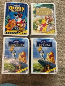 lot 140 image: Four Disney Collectable Figurines by McDonalds including Winnie the Pooh Tigger McDonalds Happy Meal Disney Masterpiece Collection 1996