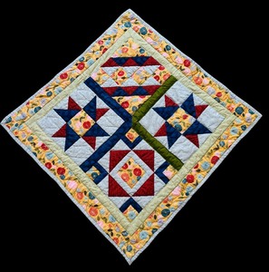 lot 163 image: Small Square Quilt with Flowers  Lap Quilt