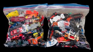 lot 113 image: Two Bags of Vintage Matchbox  Cars and More
