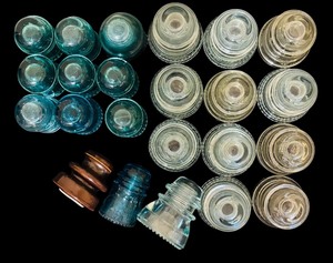 lot 112 image: Large Lot of Vintage Clear, Brown and Green Hemingray Glass Insulators