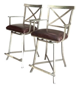 lot 16 image: Two Swivel Brown Leather and Metal Base Counter Stools by Isabella Interiors