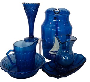 lot 99 image: Vintage Cobalt Blue Glass including Shirley Temple Bowl and Pitcher Set, Juice Pitcher and More