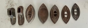 lot 252 image: Vintage Cast Iron sad Irons  Doorknob Backplates and Cobblers Shoe Lasts