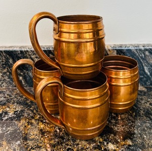 lot 32 image: Set of Four Copper Mugs by Cavalier National Silver