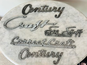 lot 17 image: Vintage Metal Boat Emblems