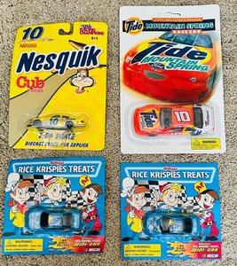 lot 73 image: Vintage NEW Hot Wheels, Nestle Nesquik Racing Car, Jeff Green #10, Monte Carlo, Ricky Rudd #10 Tide Race Car NASCAR Diecast Toy Orange White Ford and Two Vintage Sealed 164 Die Cast Nascar 5 Monte Carlo Labonte Car - Kelloggs Rice Krispies Treats