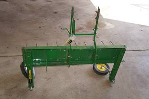 lot 9 image: John Deere Thatcher