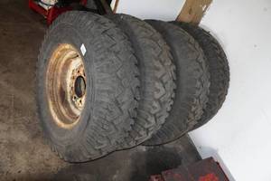 lot 78 image: 16 8-Bolt Steel Wheels with Tires