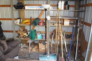 lot 127 image: Shelves with Contents - Shovels, Paint, Rakes, Cords